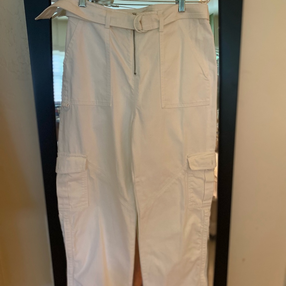 Jonathan Simkhai bomber pants with boot zippers on sides.